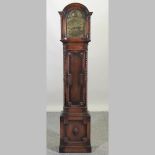 A 1920's oak cased grandmother clock,