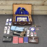 A collection of Masonic items, to include medals, a sword, a leather suitcase and a mahogany box,