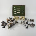 A collection of miniature model cannons,