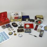 A collection of items to include watches, lighters, coins, a world war one tin,