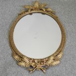 A 19th century ornate gilt framed wall mirror,