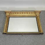 A Regency carved and gilt gesso framed wall mirror, with rope twist decoration,