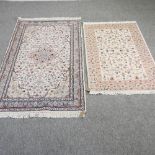 A Persian cream woollen rug, with all over foliate designs, 170 x 95cm,