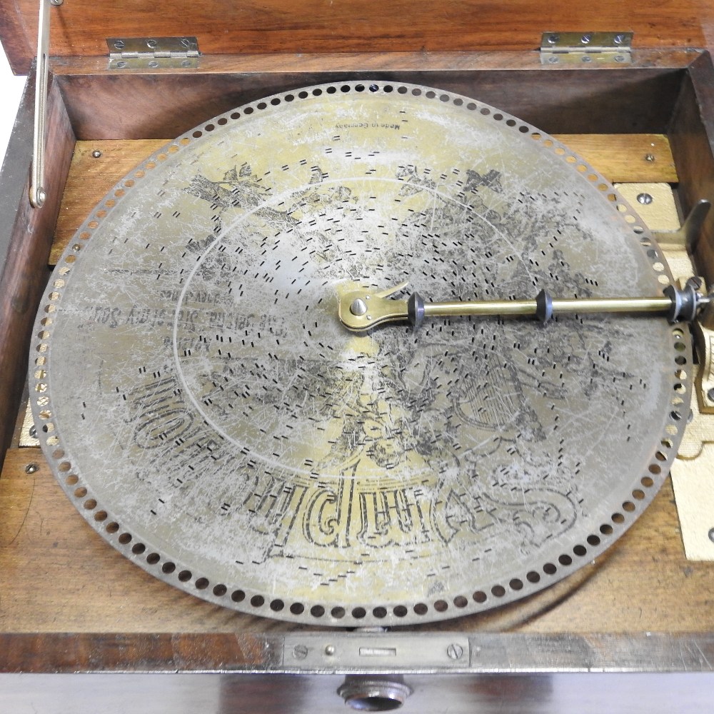 A 19th century German walnut cased wind up symphonion, the painted hinged lid, with a glass inset, - Image 5 of 17