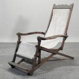 A hardwood folding deck chair