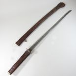 A World War II Japanese sword, in a leather scabbard,