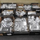 A large collection of stainless steel table wares