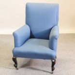 A Victorian blue upholstered armchair