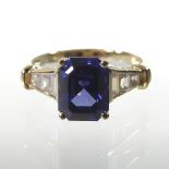 A 14 carat gold and gem set ring,