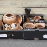 Two boxes of treen items, to include vases and bowls,