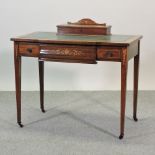 A 19th century rosewood and inlaid writing table,