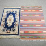 A kelim rug, with horizontal designs, together with a Chinese rug, with a blue central medallion,