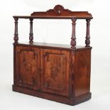 A large 19th century mahogany buffet, having a shaped gallery back,