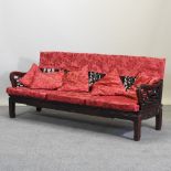 A Chinese hardwood three seater sofa,