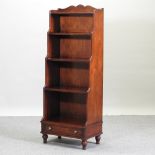 A Regency style mahogany waterfall bookcase,