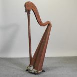 A 19th century carved wooden harp frame,
