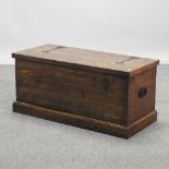 An oak blanket box,