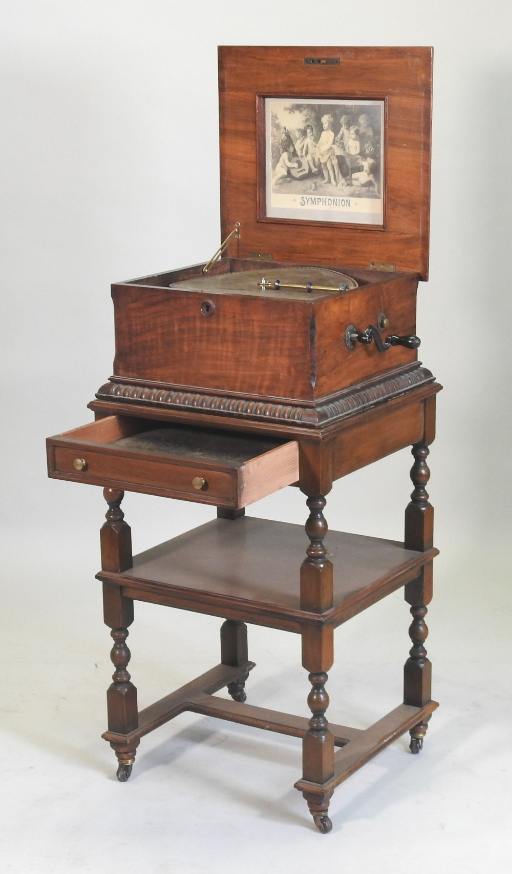 A 19th century German walnut cased wind up symphonion, the painted hinged lid, with a glass inset, - Image 6 of 17