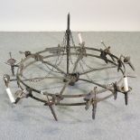 A large black painted iron chandelier, 140cm diameter,