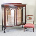 A 1920' s astragal glazed display cabinet, 122cm, together with a Victorian inlaid nursing chair,