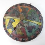 An early 20th century painted metal spinning pub game,