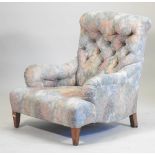 A Victorian Bridgewater Howard style upholstered armchair, by William Birch, on square tapered legs,