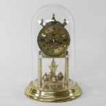 An anniversary clock, under a dome,