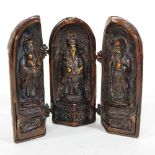 A reproduction Eastern bronzed triptych, decorated with three deities,