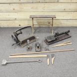 A collection of early 20th century items, to include stamping machines, measuring sticks etc.