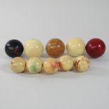 A collection of early 20th century ivory billiards balls