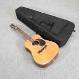 A Kimbara twelve string acoustic guitar,