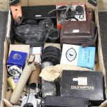 A collection of cameras and photographic equipment