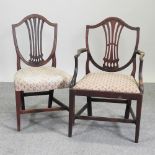 A near set of seven 19th century Hepplewhite style mahogany dining chairs