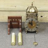 An 18th century style brass cased lantern clock, with bracket,