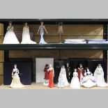 A collection of porcelain figures, mainly royal, to include the Queen and Princess Diana,