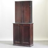 A 19th century cabinet, with a matched top,