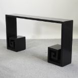 A Japanese style black lacquered side table,