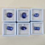A collection of six unmounted blue tanzanite gemstones,