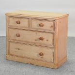 An antique pine chest of drawers,