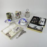 A collection of silver plated items, to include berry spoons and grape scissors,