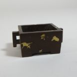 A reproduction bronze censer, with gold splash decoration,