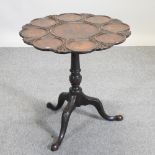 A George III mahogany supper table,