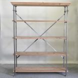 A metal framed baker's rack,