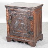 An 18th century and later adapted oak cabinet,