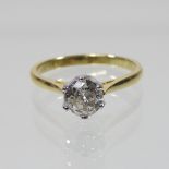 An 18 carat gold diamond solitaire ring, the single stone approximately 1.
