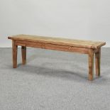 A rustic pine bench,