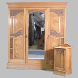 A Victorian burr walnut triple wardrobe, by Maple and Co, 200cm,