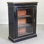 A 19th century ebonised pier cabinet,