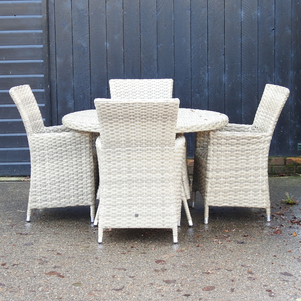 A rattan garden table, 121cm, diameter,