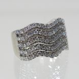 An 18 carat white gold and diamond dress ring,